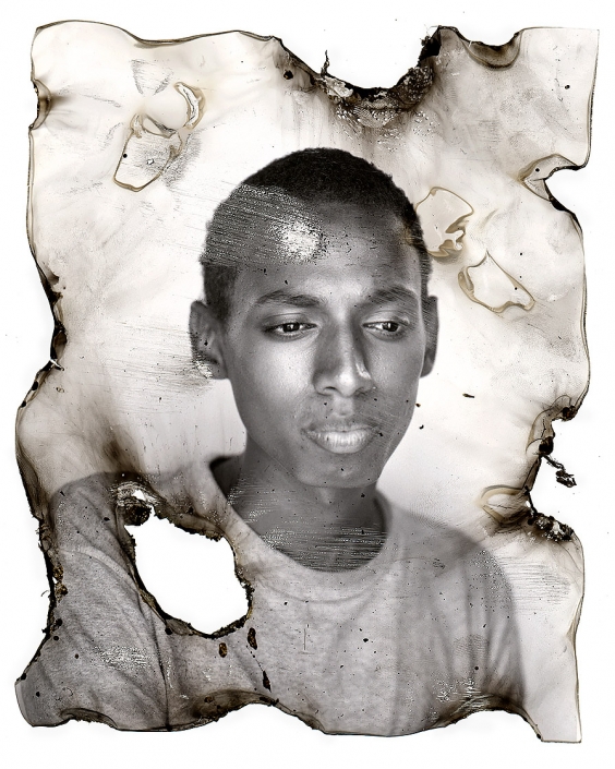 Distressed black and white portrait of homeless youth.