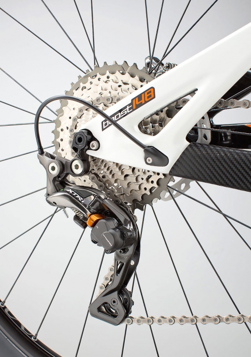 Product photography of Shimano XTR rear derailleur on white Pivot Cycles, 429Trail model mountain bike with Boost 148 by commercial photographer Jason Koster.