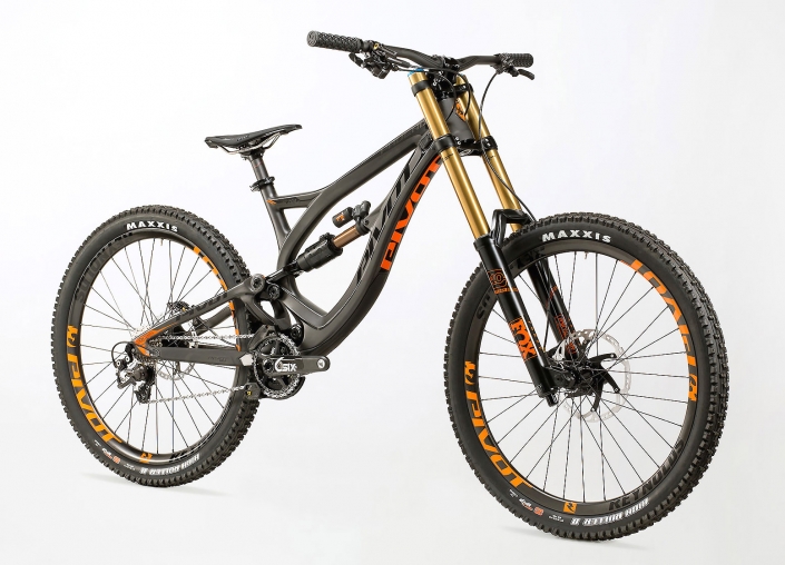 Product photography of Black carbon fiber Pivot Cycles, Phoenix model mountain bike with Reynolds wheels and Maxxis tires.